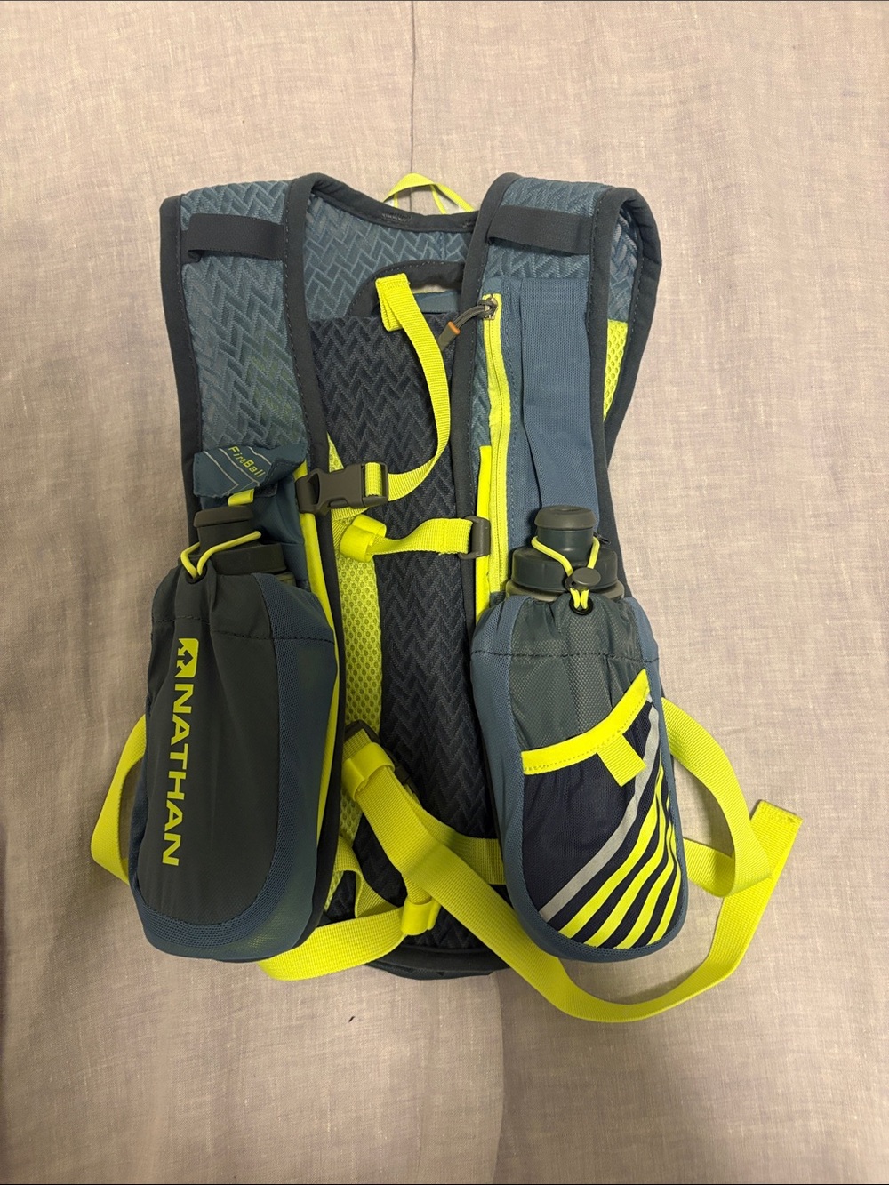 Nathan Fireball unisex Running Hydration Backpack in Gray / blue and Neon Yellow